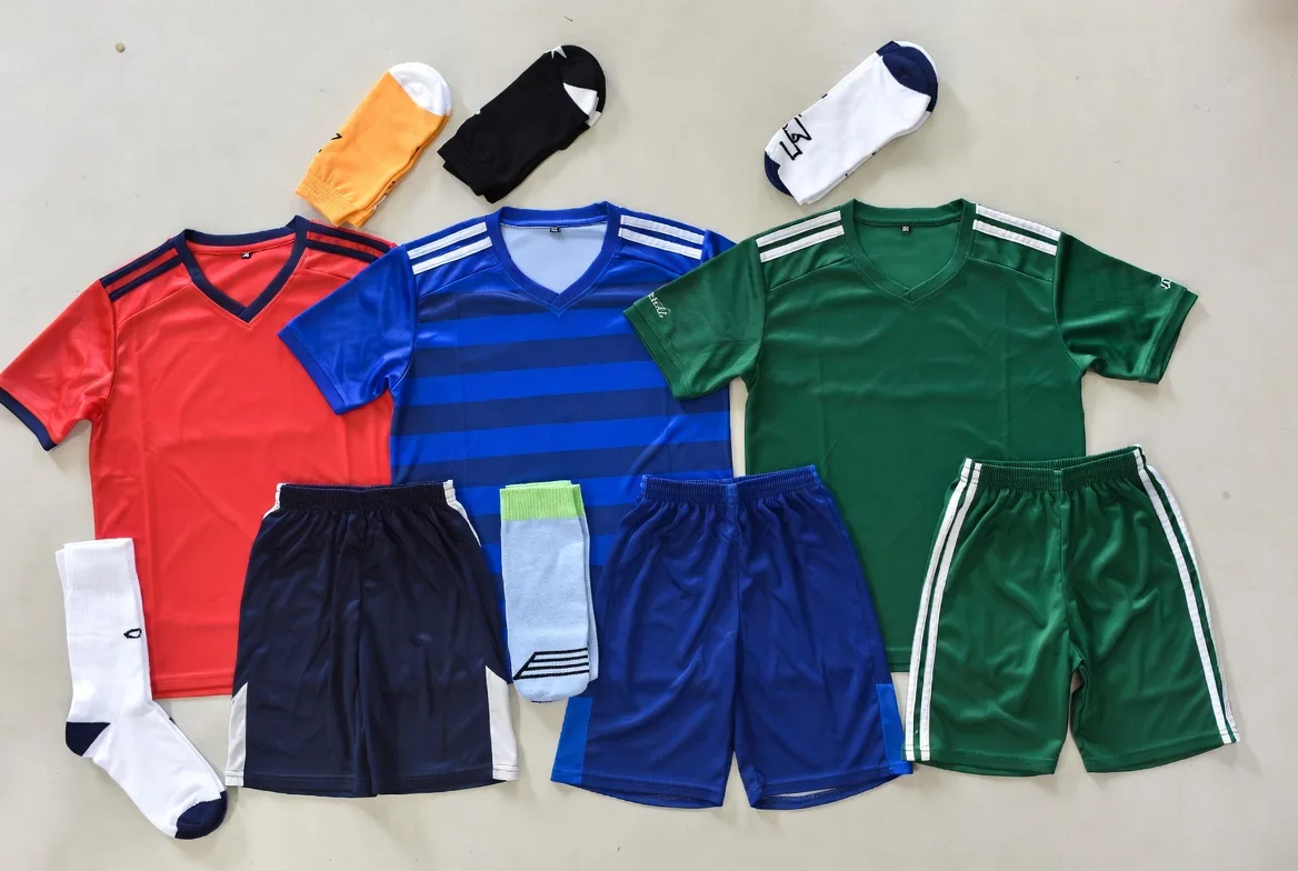 Multi-color custom soccer kit featuring blue, red and green designs