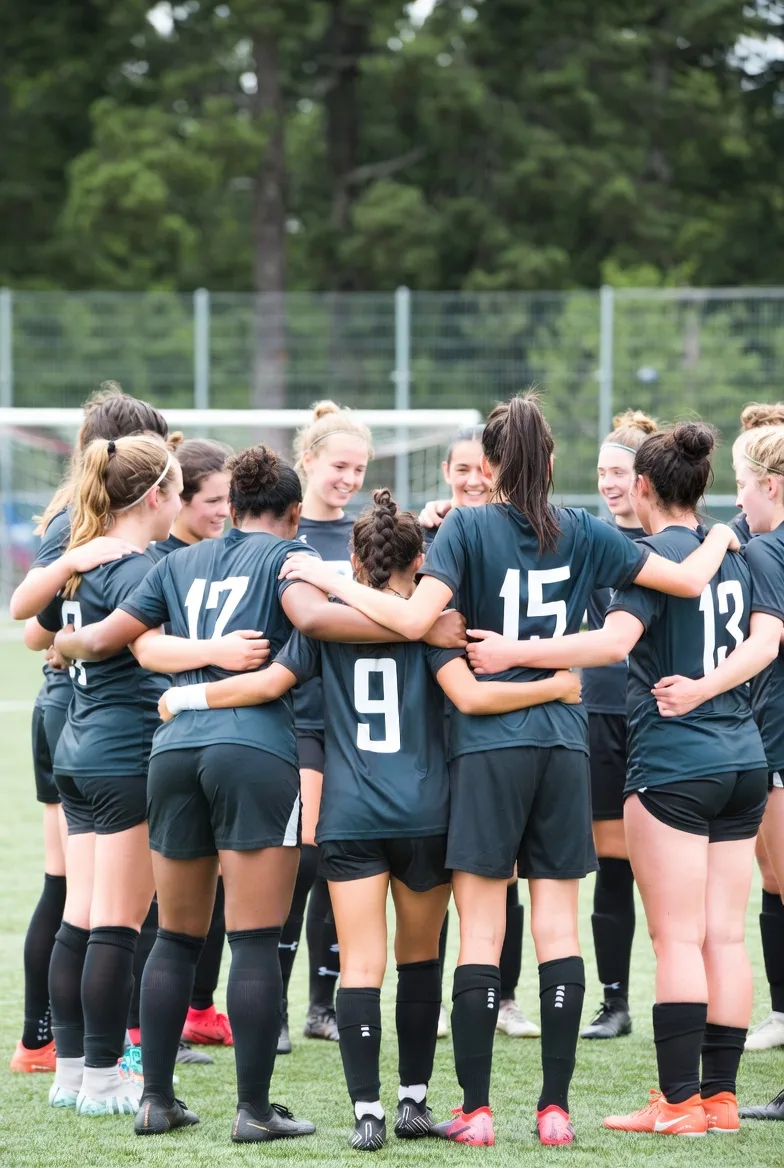 Women's football team in custom uniforms