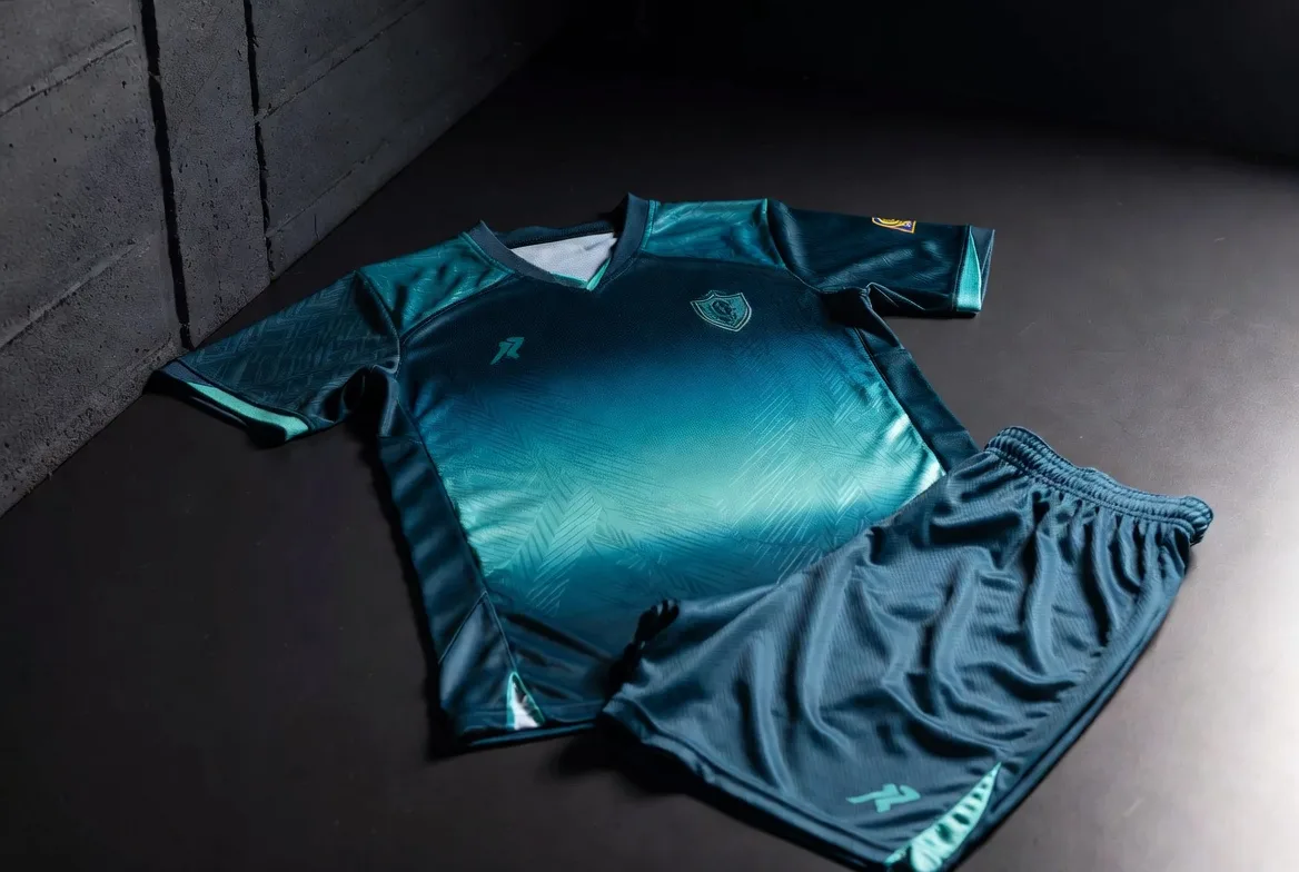 Unisex green youth soccer jersey with custom club branding